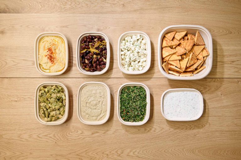 A delicious and colorful spread of Middle Eastern mezze, featuring a variety of dips, spreads, and small plates