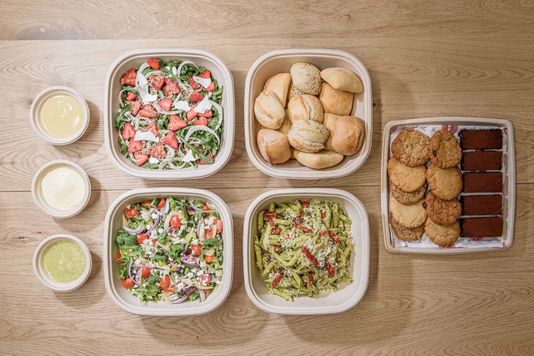 A delicious and satisfying spread of fresh salads and desserts, perfect for any occasion.